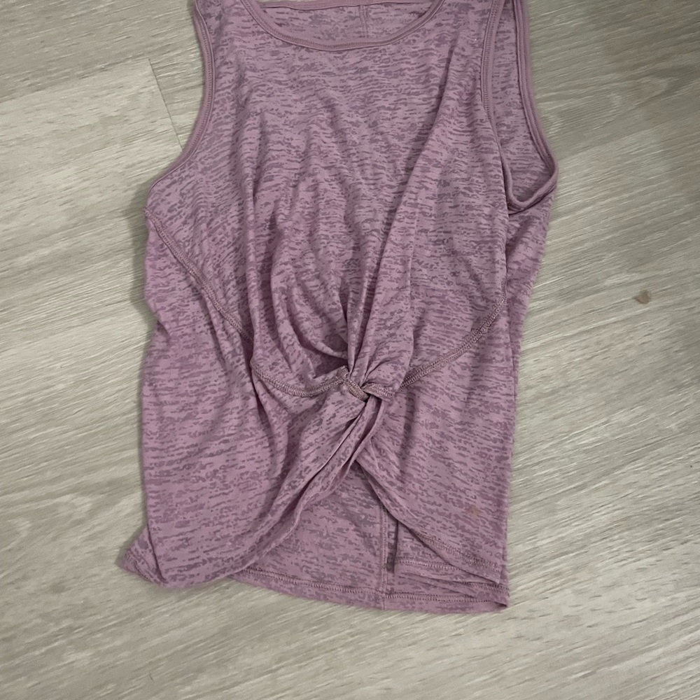 Lululemon. Light purple tank size 0 good condition ties in the front